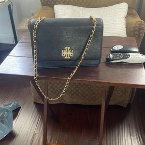 Tory Burch Black purse. I bought it and never used it.